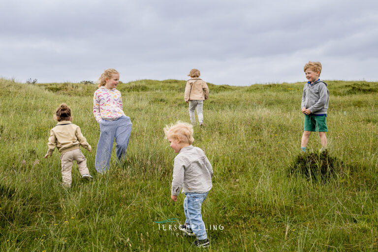 Familiefotograaf op het strand